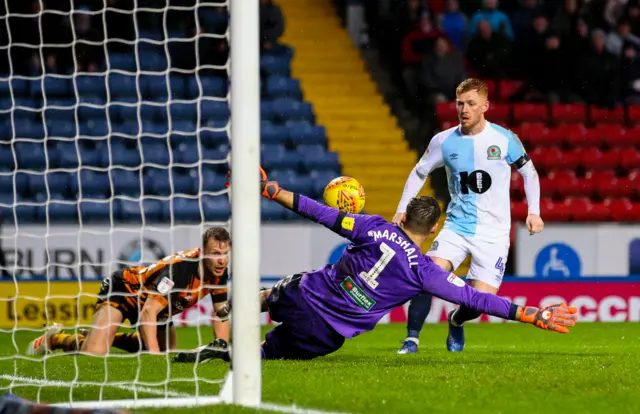 Harrison Reed clips over David Marshall for goal number three