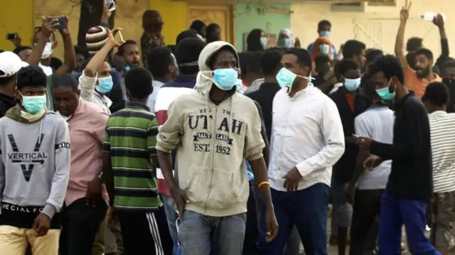 Protesters wearing masks in Sudan