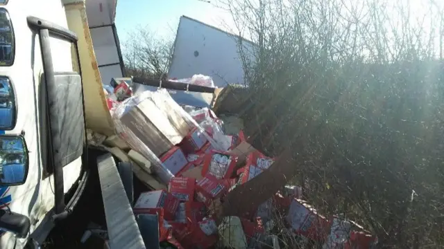 The load spilt from the overturned lorry