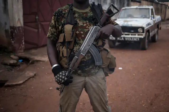 Man holding gun