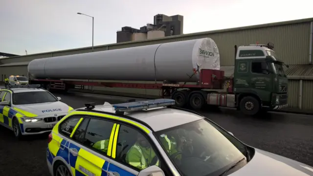 Police cars next to the abnormal load