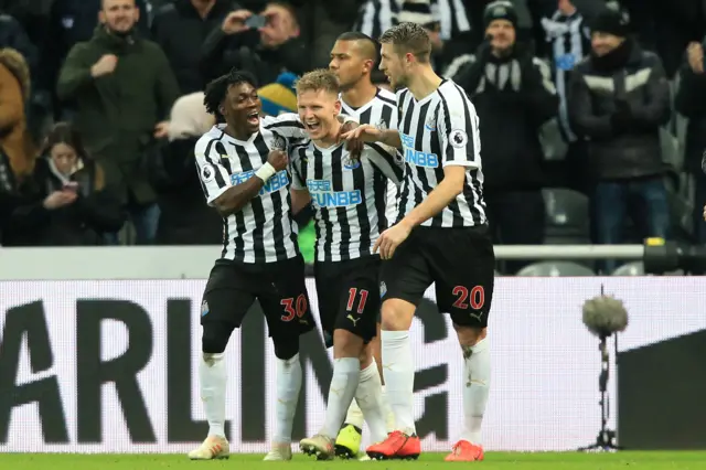 Newcastle players celebrate