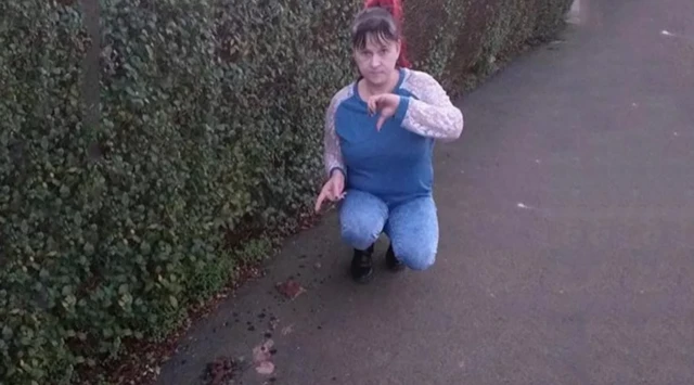 Dog poo woman