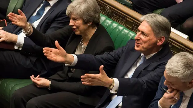 Theresa May and Philip Hammond