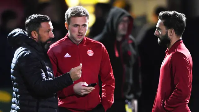 Aberdeen manager Derek McInnes with Greg Stewart and Graeme Shinnie