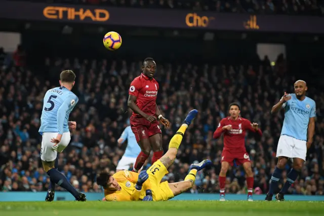 John Stones attempts to clear