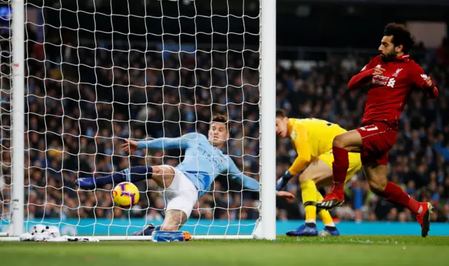 John Stones clears off the line