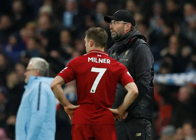 Jurgen Klopp and James Milner