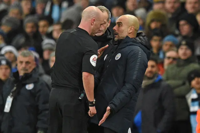 Anthony Taylor and Pep Guardiola