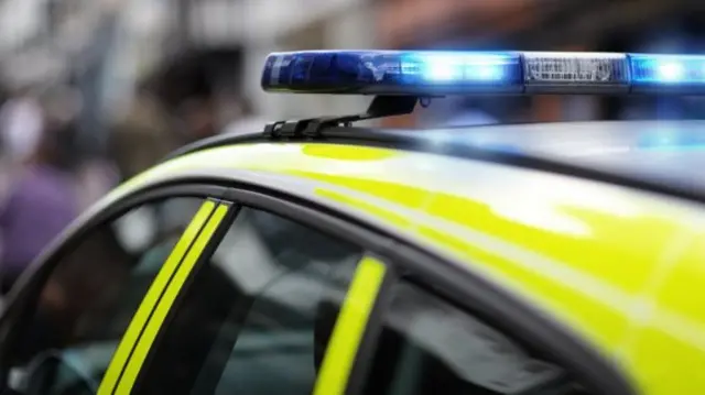 Siren on police car roof