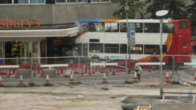 The bus having hit the supermarket