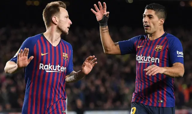 Ivan Rakitic celebrates scoring against Sevilla