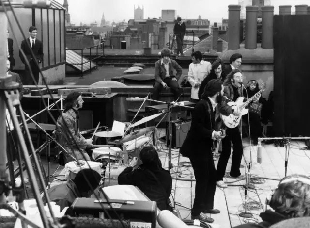 Beatles on rooftop