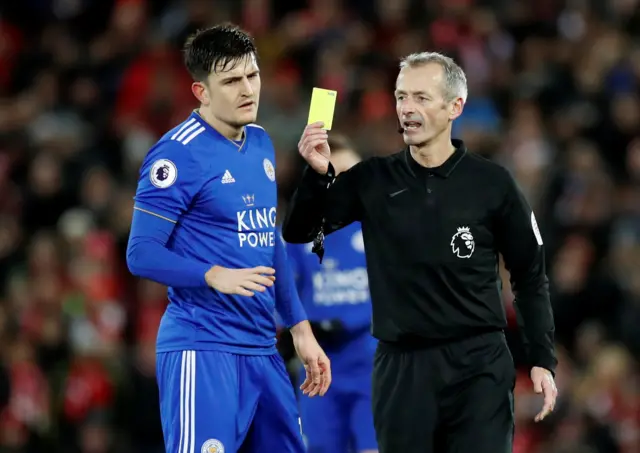 Harry Maguire receives a yellow card