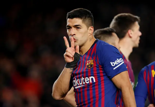 Luis Suarez celebrates