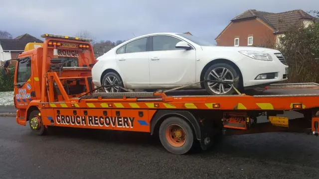 Car on a recovery truck