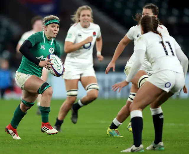 Ireland's Claire Molloy runs with the ball against England