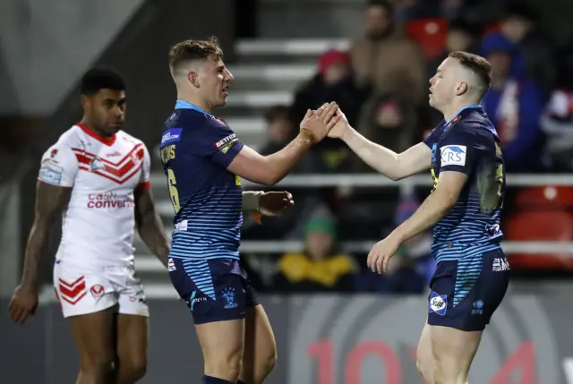 Wigan celebrate a try