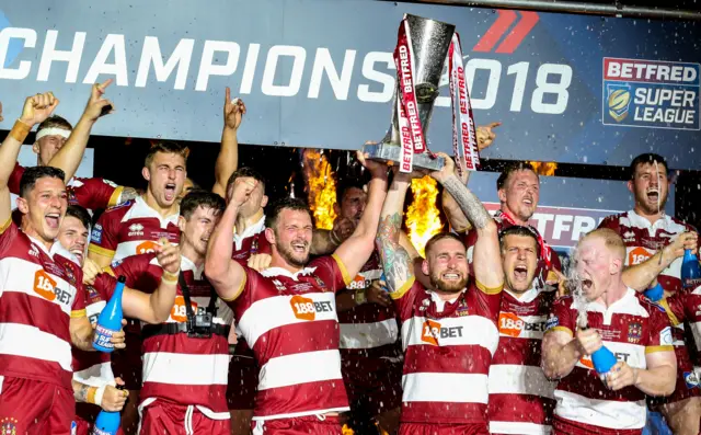 Wigan with the Grand Final trophy