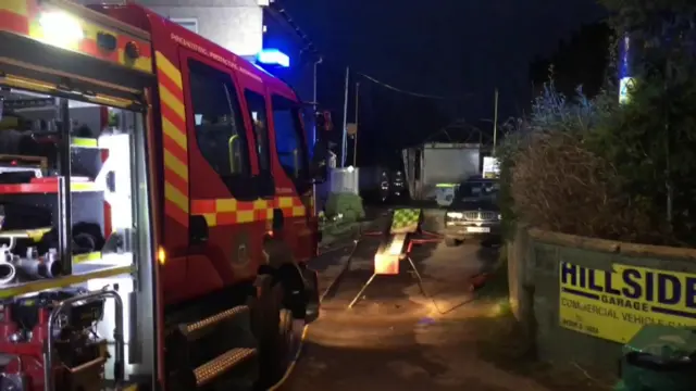 A fire engine at the scene of the Redruth garage blaze