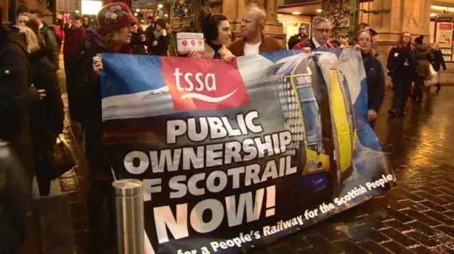 Protesters called for rail services to be brought into public ownershipbbc