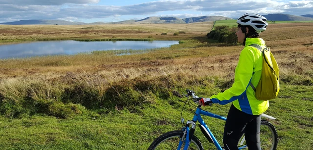 Sunbiggin Tarn and cyclist