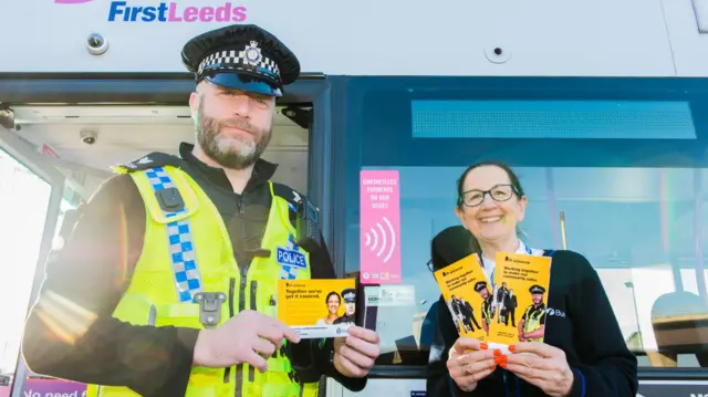 Police with posters