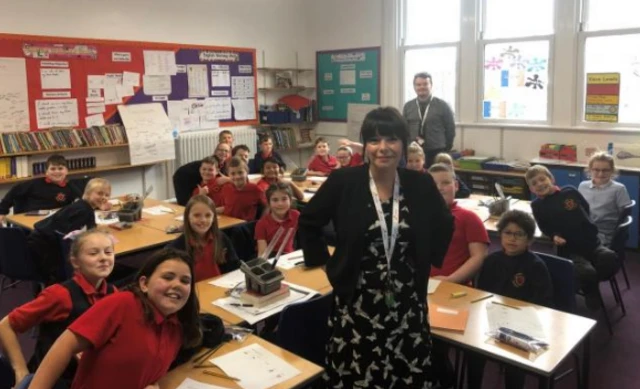 Classroom with children and head in Caldew Lea School