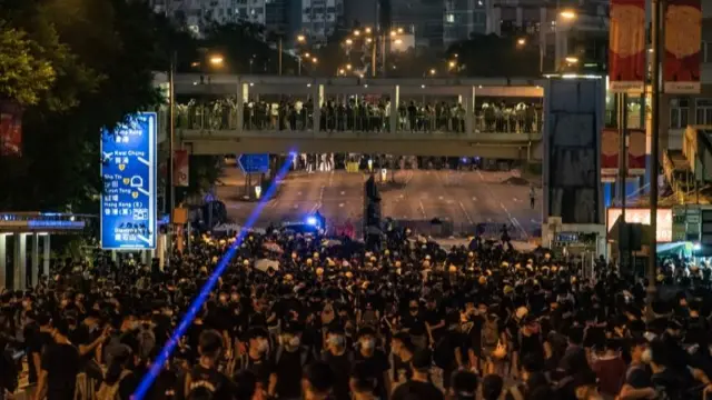 Protesters and police in the Wong Tai Sin district of Hong Kong