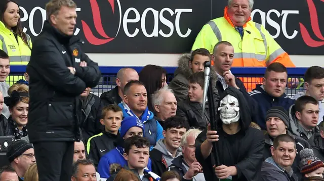 David Moyes and an Everton fan dressed as the Grim Reaper