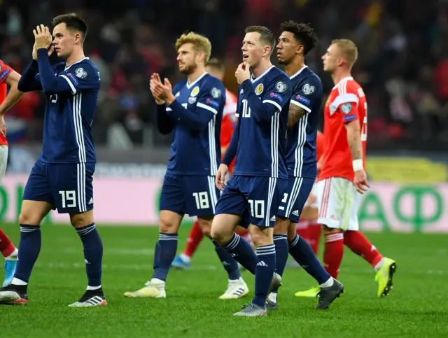 Disappointed Scotland players applaud visiting fans at full time