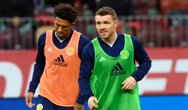 John Fleck and Liam Palmer in the warm-up in Moscow