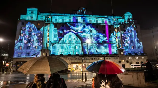 Art work projected on to the Queens Hotel during Leeds Light Night