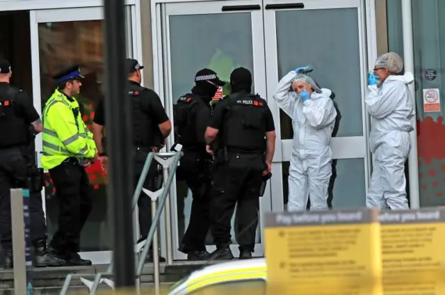 Forensics at scene of Manchester city centre