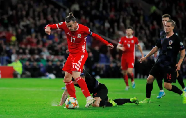 Wales' Gareth Bale scores their first goal