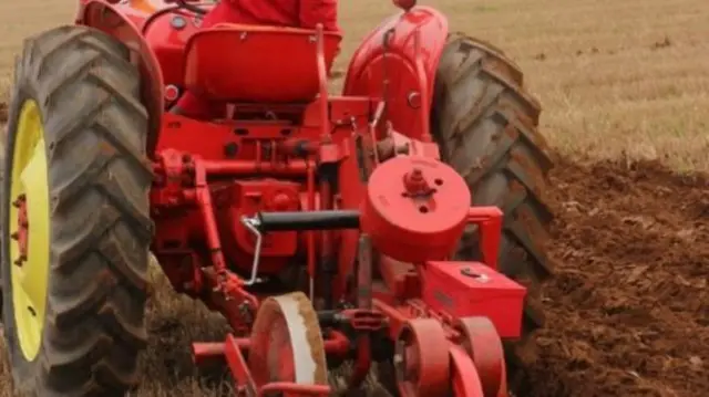 Tractor and plough