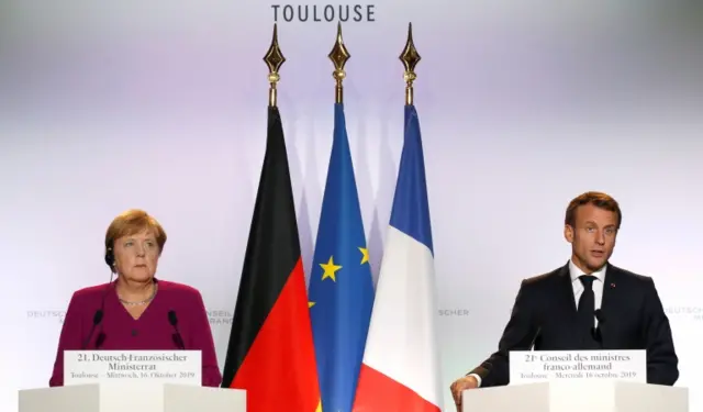 Angela Merkel and Emmanuel Macron