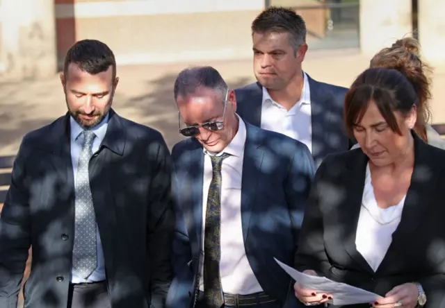 Paul Gascoigne with his solicitor outside court