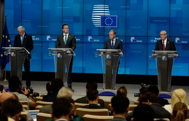 EU chief Brexit negotiator Michel Barnier, Ireland's Prime Minister Leo Varadkar, European Council President Donald Tusk and European Commission President Jean-Claude Juncker address a press conference during an European Union summit at European Union HQ in Brussels