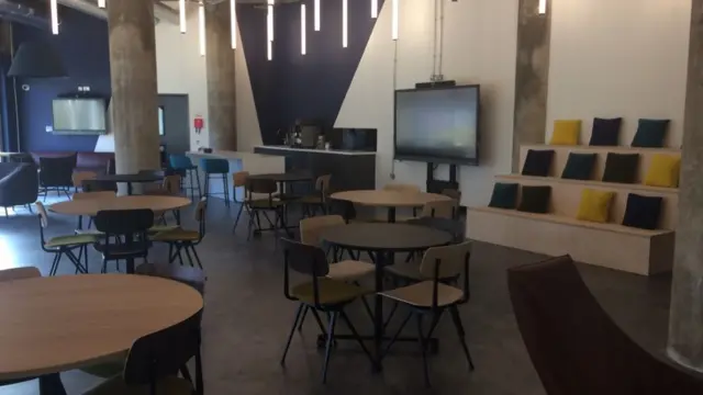 Community space with chairs and tables