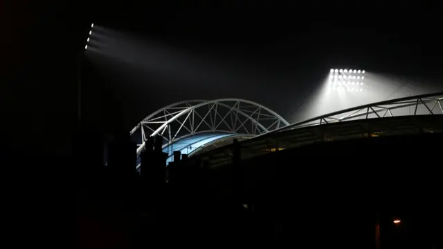 John Smith's Stadium under floodlights