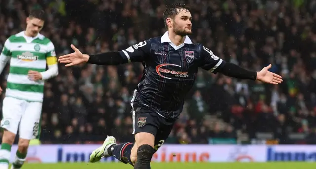 Alex Shalk celebrates scoring for Ross County against Celtic
