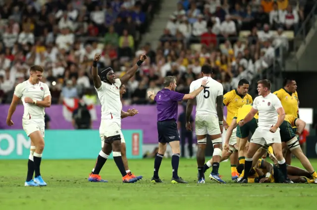 Maro Itoje of England celebrates as referee Jerome Garces awards a penalty during the Rugby World Cup 2019 Quarter Final match between England and Australia at Oita Stadium