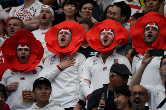 England fans sing the national anthem before the Japan 2019 Rugby World Cup quarter-final match between England and Australia at the Oita Stadium in Oita