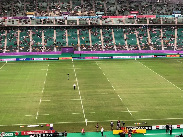 Eddie Jones in the middle of the Oita pitch