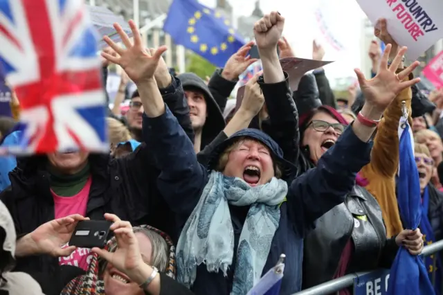 Protesters cheer in London