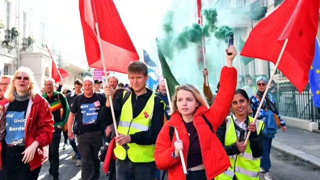 EU supporters, calling on the government to give Britons a vote on the final Brexit deal, attend a "People"s Vote" march in London