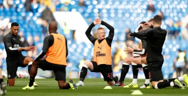 Matty Longstaff warms up