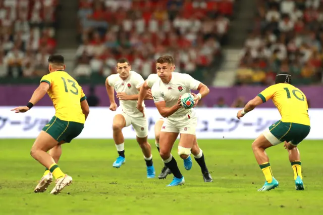 Henry Slade of England runs with the ball during the Rugby World Cup 2019 Quarter Final match between England and Australia at Oita Stadium