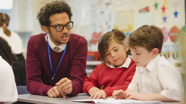 Teacher and pupils